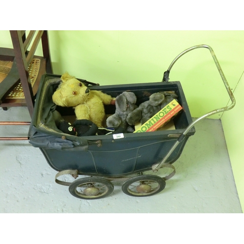 244 - Old toy pram with assorted toys, and teddy bear