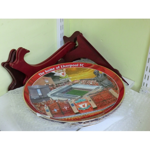 252 - Four large Liverpool FC collectors' display plates with stands