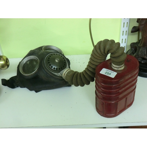 255 - WWII gas mask with hose and filter canister