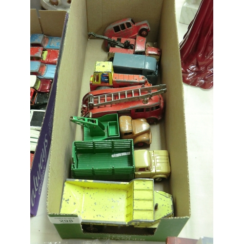 298 - A collection of Dinky and Corgi trucks and machines, some early Dinky