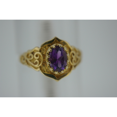 309 - 9 ct gold ornate amethyst ring, size O