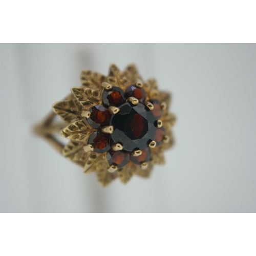 310 - 9 ct gold garnet cluster ring, size O