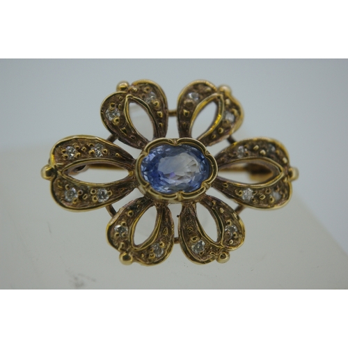 312 - 9 ct gold Ceylon sapphire and diamond brooch