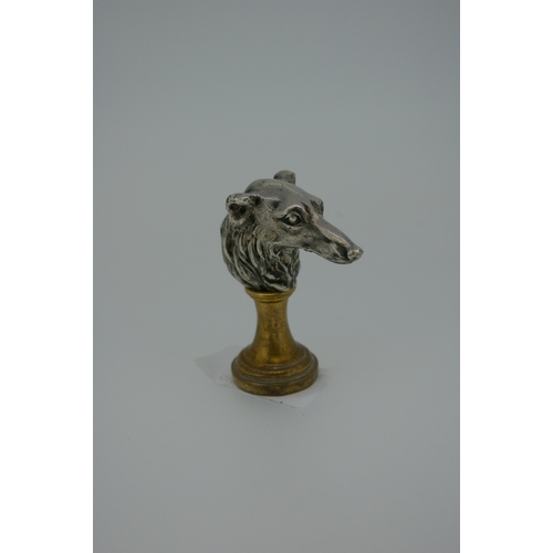 348 - Silver metal and ormolu seal with lurcher's head to top