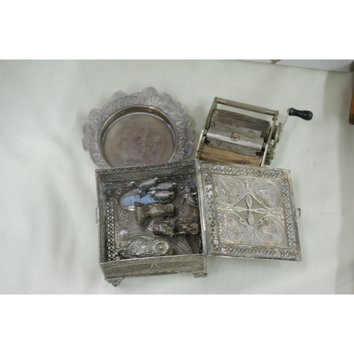 352 - Silver metal filigree box containing some silver animals with a dish and a razor sharpener