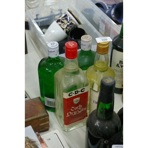 356 - Four bottles of gin including Cork Dry Gin