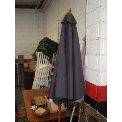 8 - Two garden parasols NB At Peel Road warehouse READ THE AUCTION INFO