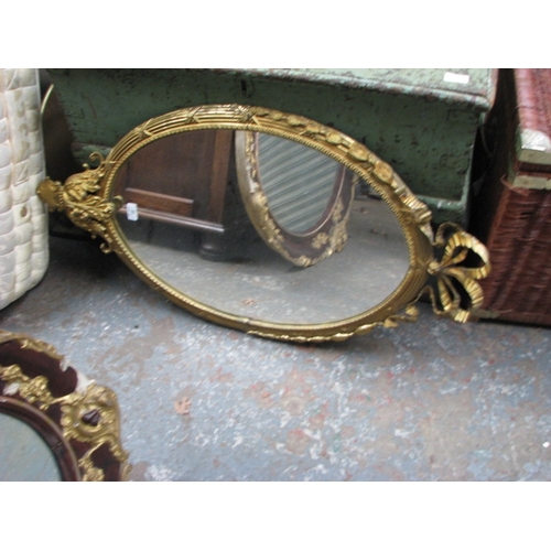 80 - Ornate oval metal gilt framed mirror NB At Peel Road warehouse READ THE AUCTION INFO