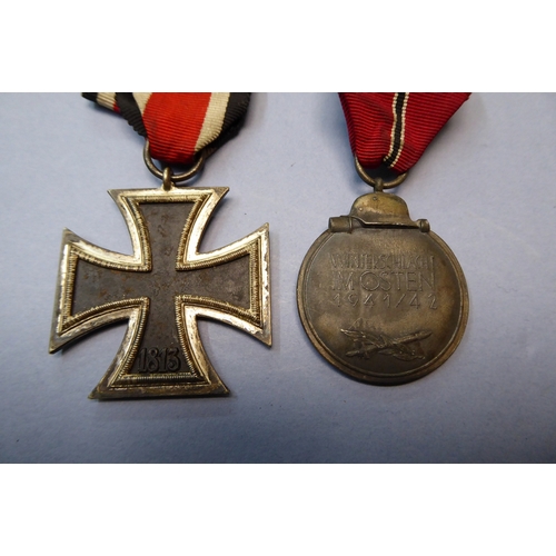 53 - Two WWII German medals - Iron Cross plus Winterschlacht Imosten 1941 / 1942 medals