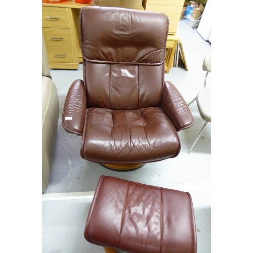 257 - Ekornes Stressless chocolate leather recliner swivel chair with matching stool