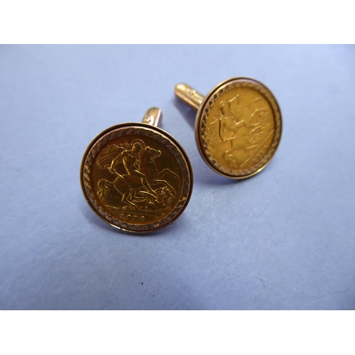 108 - Pair of half sovereign cuff links set in 9ct Gold - total wt. 18g