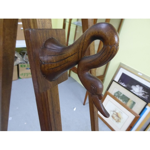 172 - Quality wooden display easel with swan heads to side struts, height 6 ft approx.