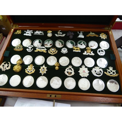 206 - A collection of twenty six silver medallions of Regiments in the British Army together with badges -... 