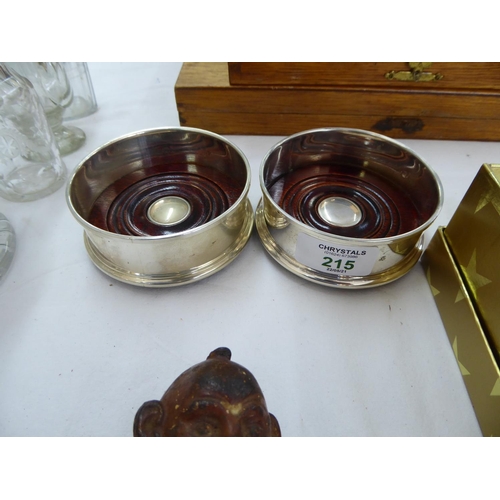 215 - Two silver bottle coasters (pair)