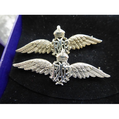 41 - Two silver RAF brooches