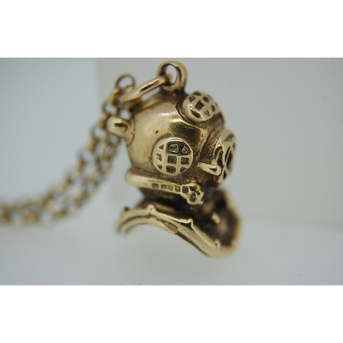 105 - 9ct gold diver's helmet pendant on a 9ct gold chain - total wt. 14.5g