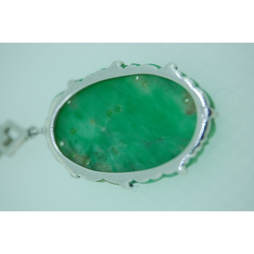 188 - 9ct white gold art deco carved green jade pendant in original box - total weight 6.5g