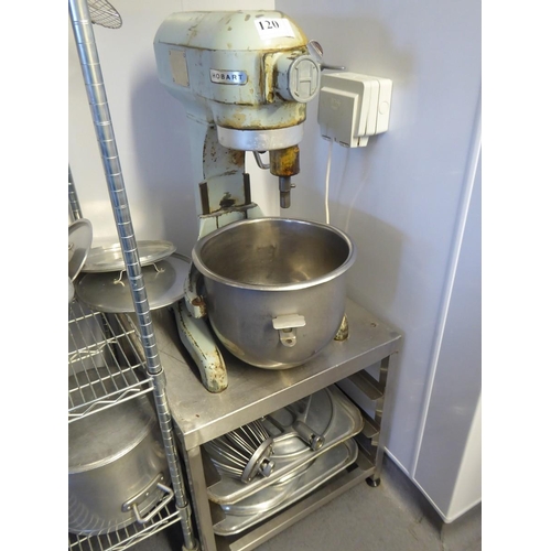 120 - Hobart commercial mixing machine standing on a SS table with accessories underneath