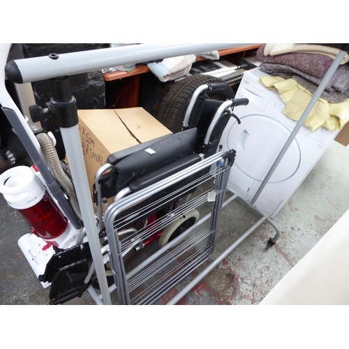 24 - Folding wheelchair plus a clothes hanging rail and an airer NB. This lot is at our Peel Road store. ... 