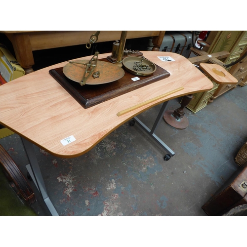 31 - Modern table/desk on casters NB. This lot is at our Peel Road store. READ THE SALE INFO