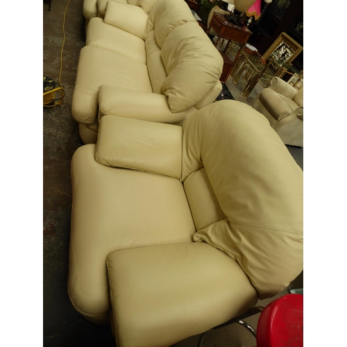 51 - Three seater cream leather settee plus a matching chair NB. This lot is at our Peel Road store. READ... 