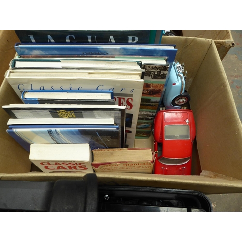 57 - Box of books on cars, plus two model cars NB. This lot is at our Peel Road store. READ THE SALE INFO