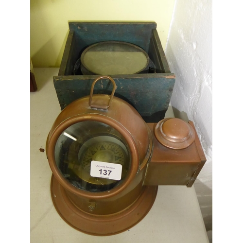 137 - A Brass cased boat compass with candlelight attachment together with another cased compass on gimbal