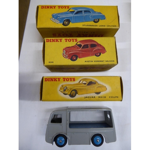 14 - Three boxed Dinky toys, Studebaker Landcruiser No. 172, Austin Somerset saloon No. 40J and a Jaguar ... 