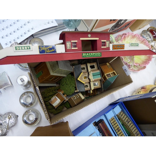 27 - A box of model buildings and a platform for a model railway