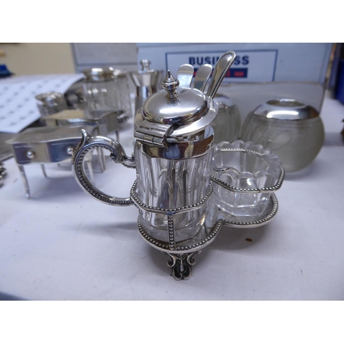 28 - A silver three piece cruet set London marks including three silver spoons