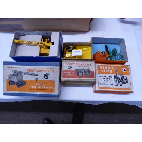 5 - Three boxed Dinky toys - a mobile crane, dumper truck and a fork lift