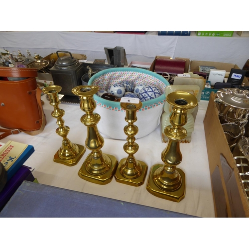 6 - Four brass candlesticks