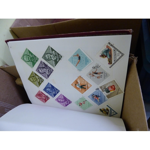 265 - A box of assorted stamp albums