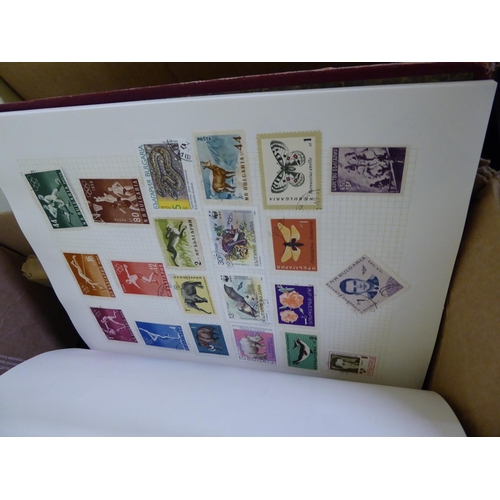 265 - A box of assorted stamp albums