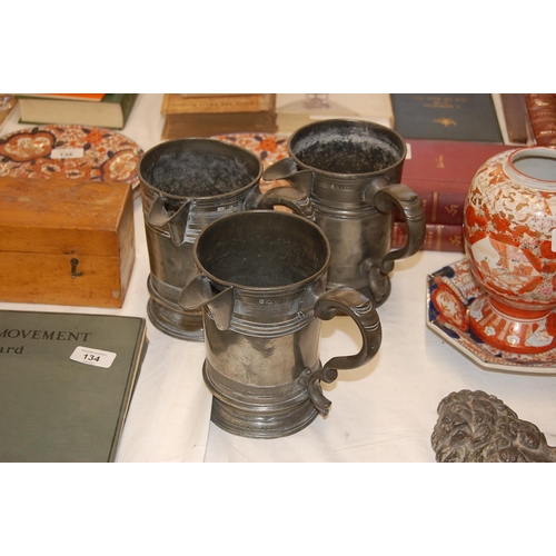 133 - Three Victorian Quart pewter tankards