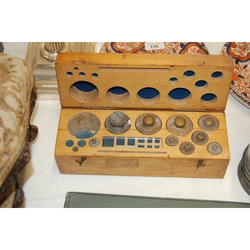 135 - A collection of brass gramme weights (boxed)