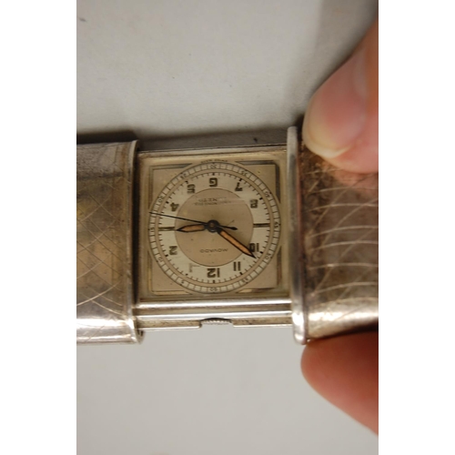 72 - A Movado silver cased travel watch (working)