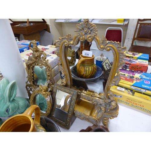 239 - A collection of ornate dressing table and small mirrors