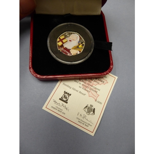 297 - A 2011 Isle of Man sterling silver proof Christmas coloured 50 pence coin cased with certificate