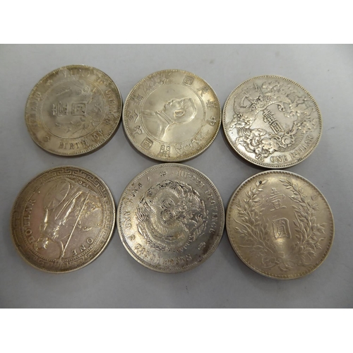 126 - Six Chinese silver coins, dollars etc