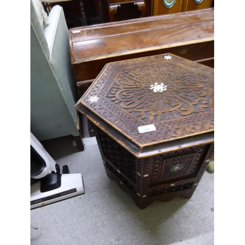 249 - Carved hexagonal wooden table with mother of pearl inlay to sides and top