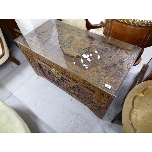 261 - Carved camphor wood chest with glass to top