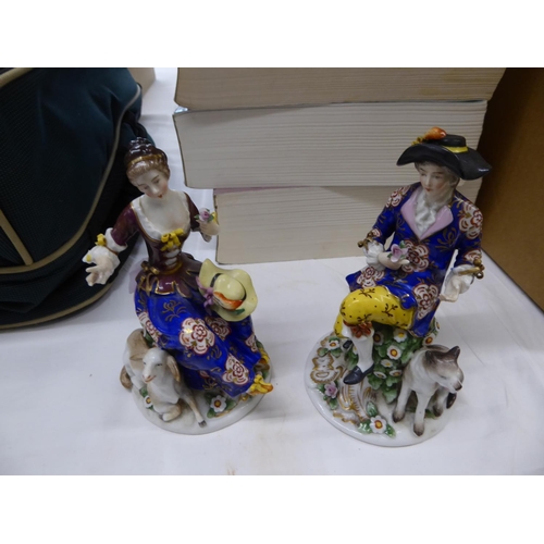 345 - A pair of porcelain figures in the Meissen style