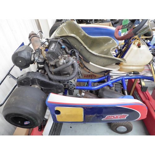 22 - TKM Kart & Spares
 Includes spares and trolley Everything you need to go racing!