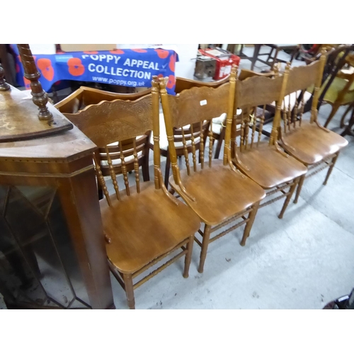 312 - Set of four oak carved back kitchen chairs