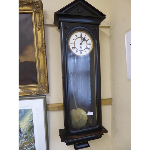 132 - An ebonised single weight Vienna clock