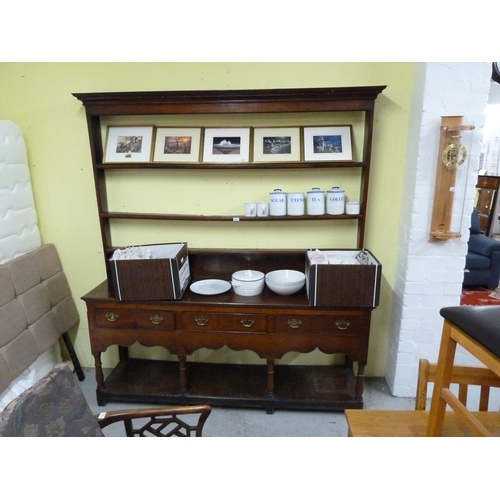 226 - Oak dresser with three drawers to base with brass swing handles