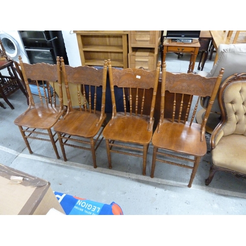 312 - Set of four oak carved back kitchen chairs