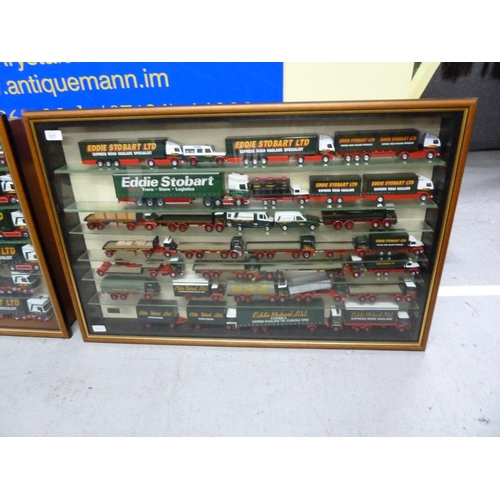 317 - Large glass display cabinet full of Eddie Stobart waggons