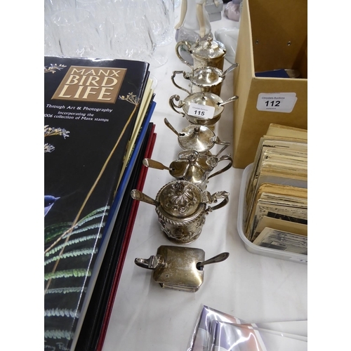 115 - Seven Victorian and later silver mustard pots with silver spoons